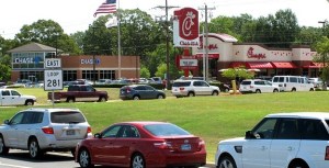Picture from www.dailymail.co.uk. In Longview, Texas, trucks and SUVs spilled out of the parking lot and lined the streets, waiting to get into the drive-through for Chick-fil-A. 